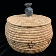 Cover image of Lidded Basket with Four Faces
